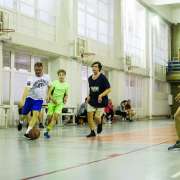 ILS 8th graders and parents battle on basketball court